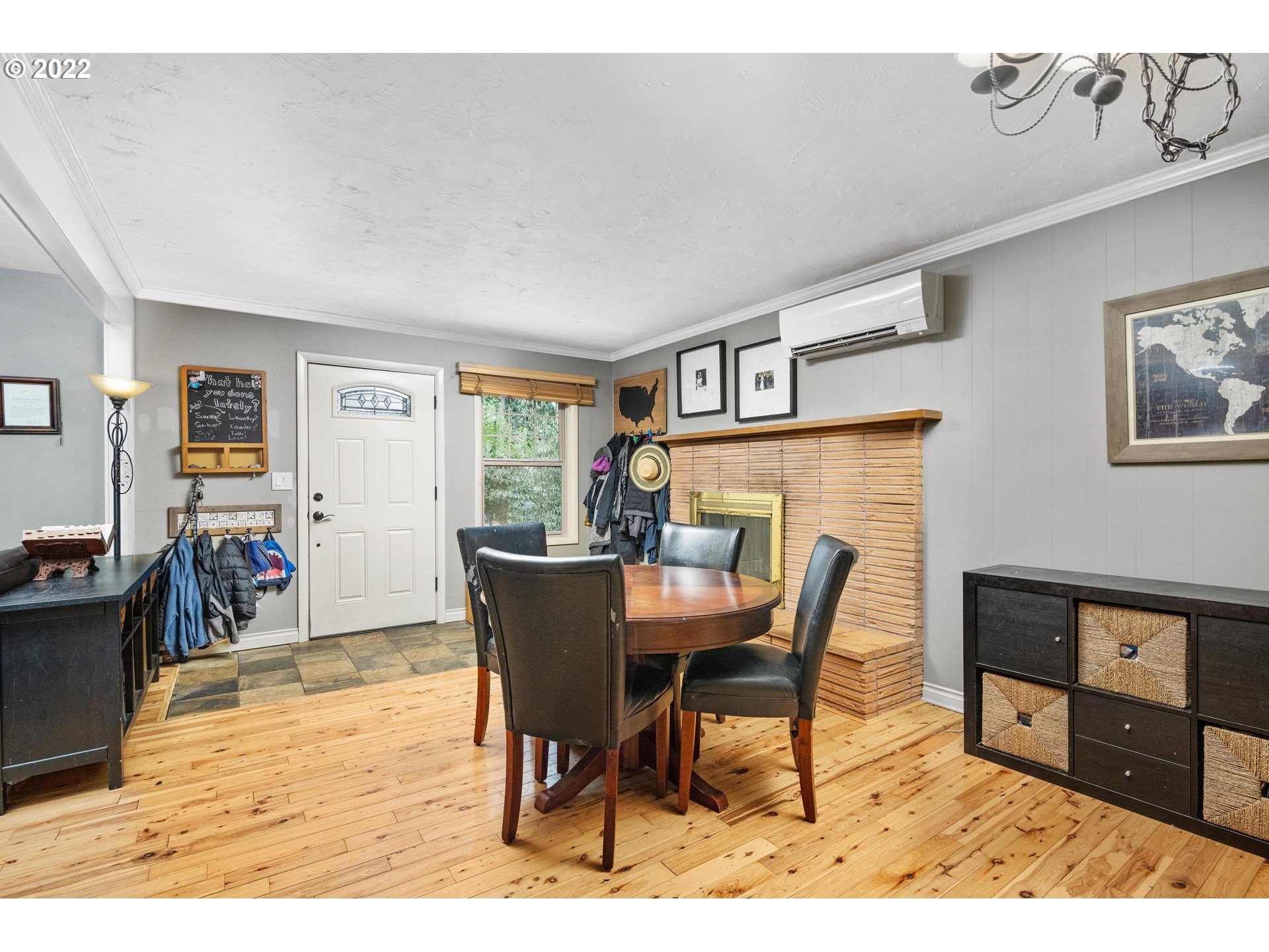 12855 Southwest Douglas Street Portland, OR 97225 - Photo 7 of 32 a view of a dining room with furniture and wooden floor