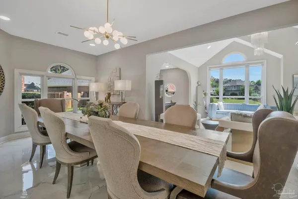 a view of a dining room with furniture