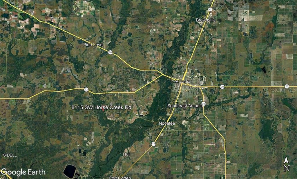 8115 Southwest Horse Creek Road Arcadia, FL 34266 - Photo 4 of 4 a view of a yard