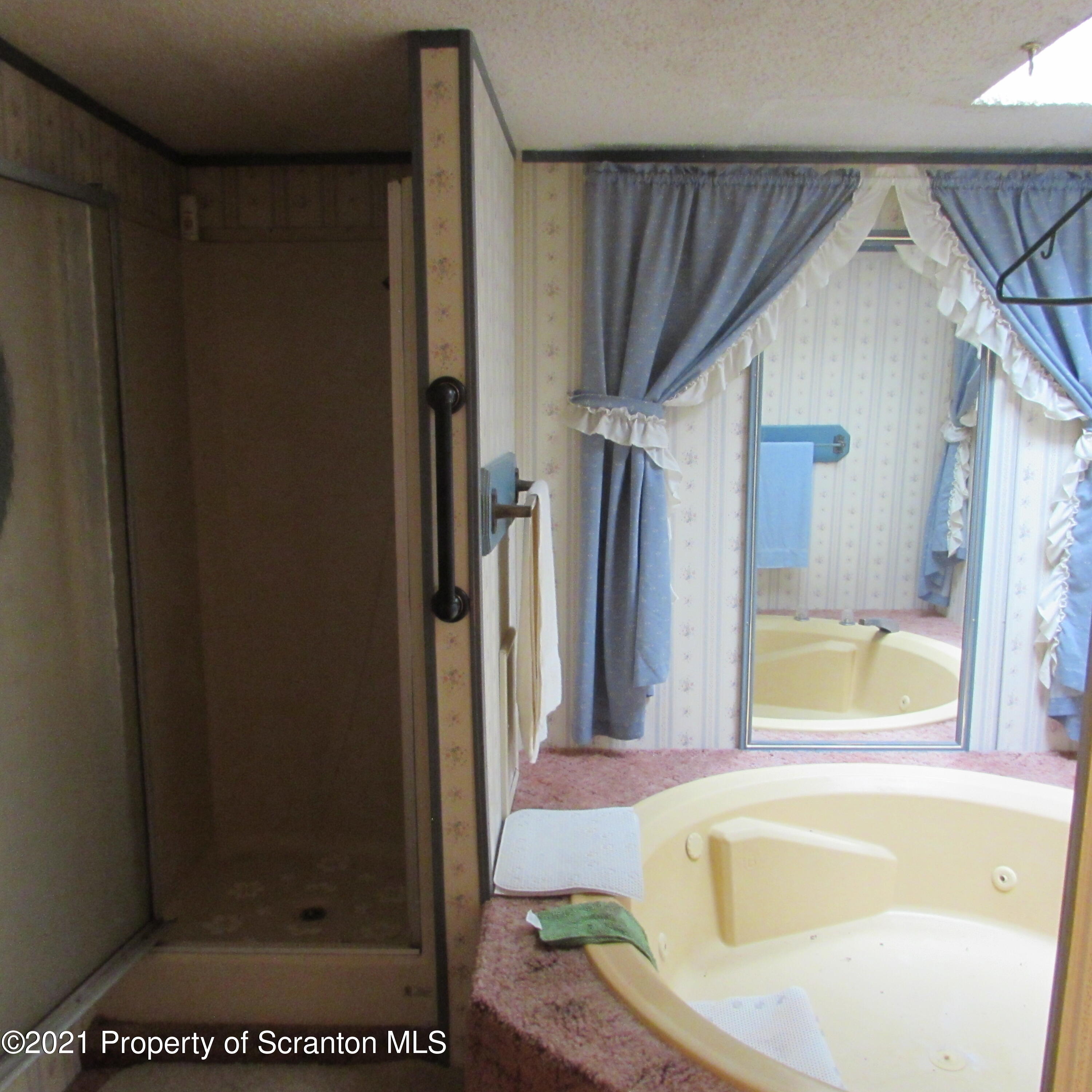 7211 State Rte 3001 Meshoppen, PA 18630 - Photo 16 of 23 a bathroom with a bathtub and a shower