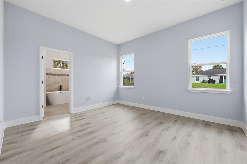 13975 Southwest 27 Ct Road Ocala, FL 34473 - Photo 21 of 35 a view of empty room with wooden floor