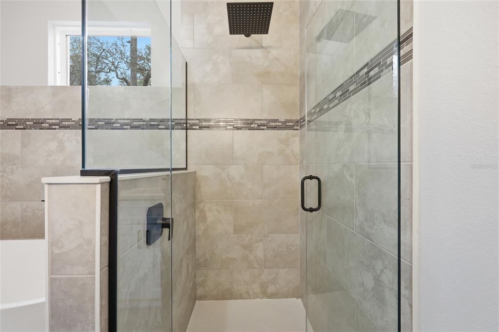 13975 Southwest 27 Ct Road Ocala, FL 34473 - Photo 30 of 35 a bathroom with a shower