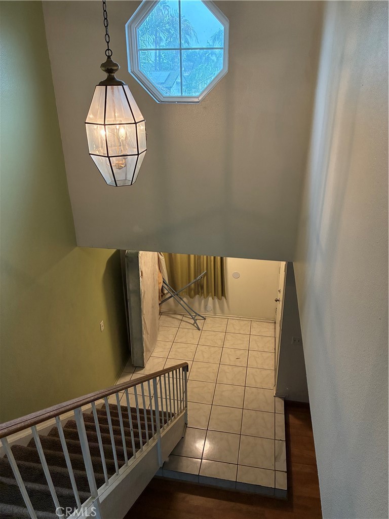 1144 North Glenwood Avenue Rialto, CA 92376 - Photo 21 of 35 a view of staircase with wooden floor