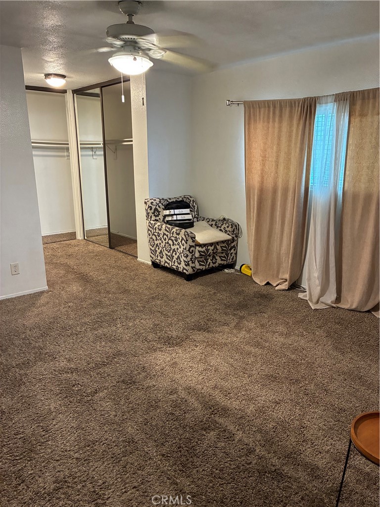 1144 North Glenwood Avenue Rialto, CA 92376 - Photo 29 of 35 a view of a livingroom with a staircase