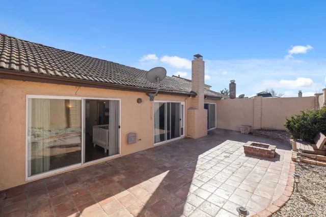 a picture of a table and chairs with wooden floor