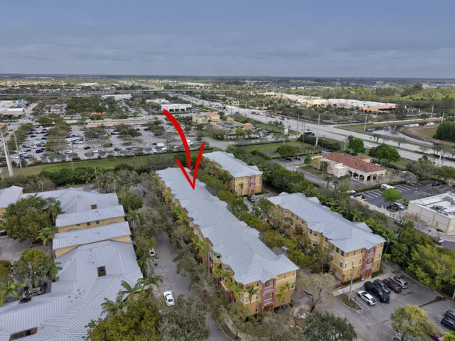 a view of a swimming pool with a yard