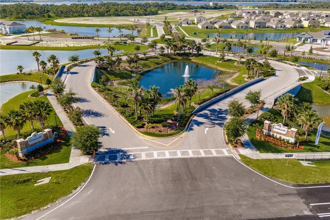 3453 Trinity Circle Fort Pierce, FL 34945 - Photo 35 of 36 an aerial view of a house with a swimming pool and outdoor space