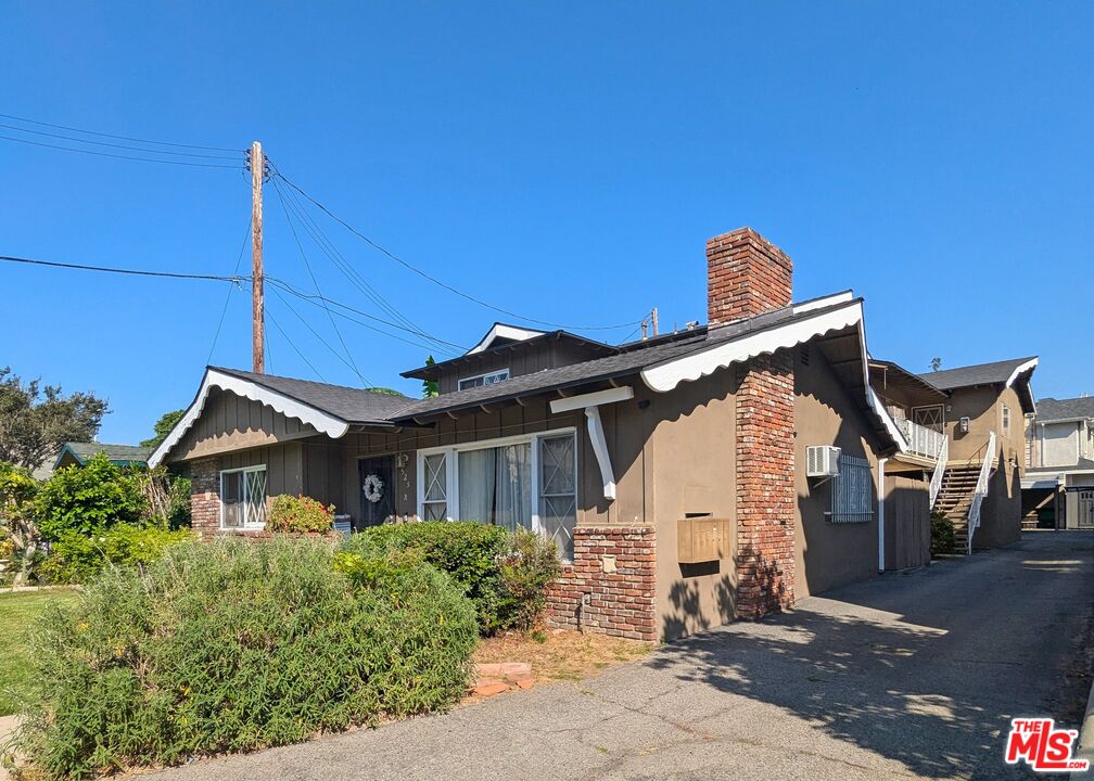 525 Howard Street Alhambra, CA 91801 - Photo 3 of 6 a view of a house with a street