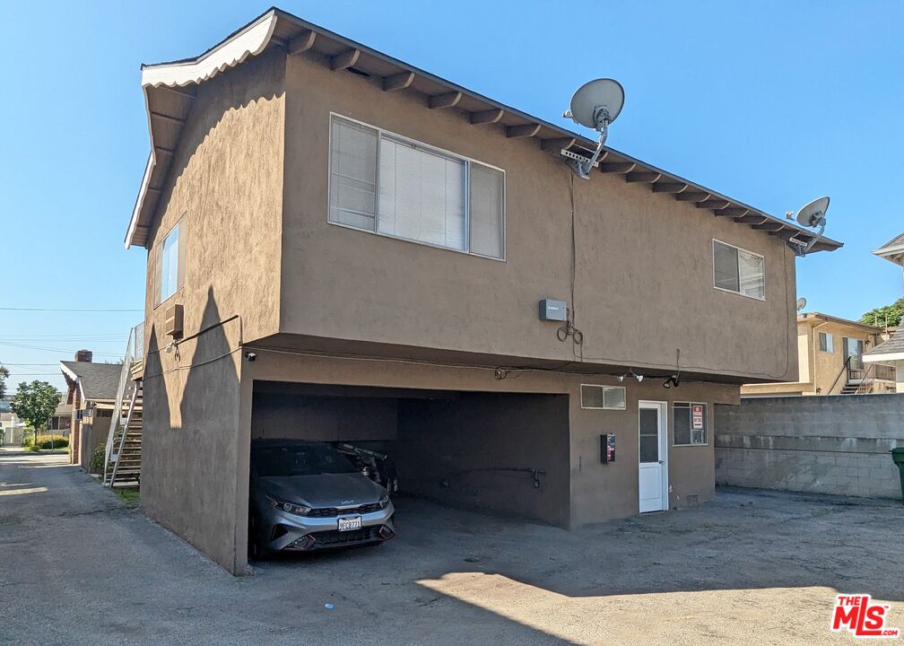 525 Howard Street Alhambra, CA 91801 - Photo 6 of 6 a car parked in front of a house