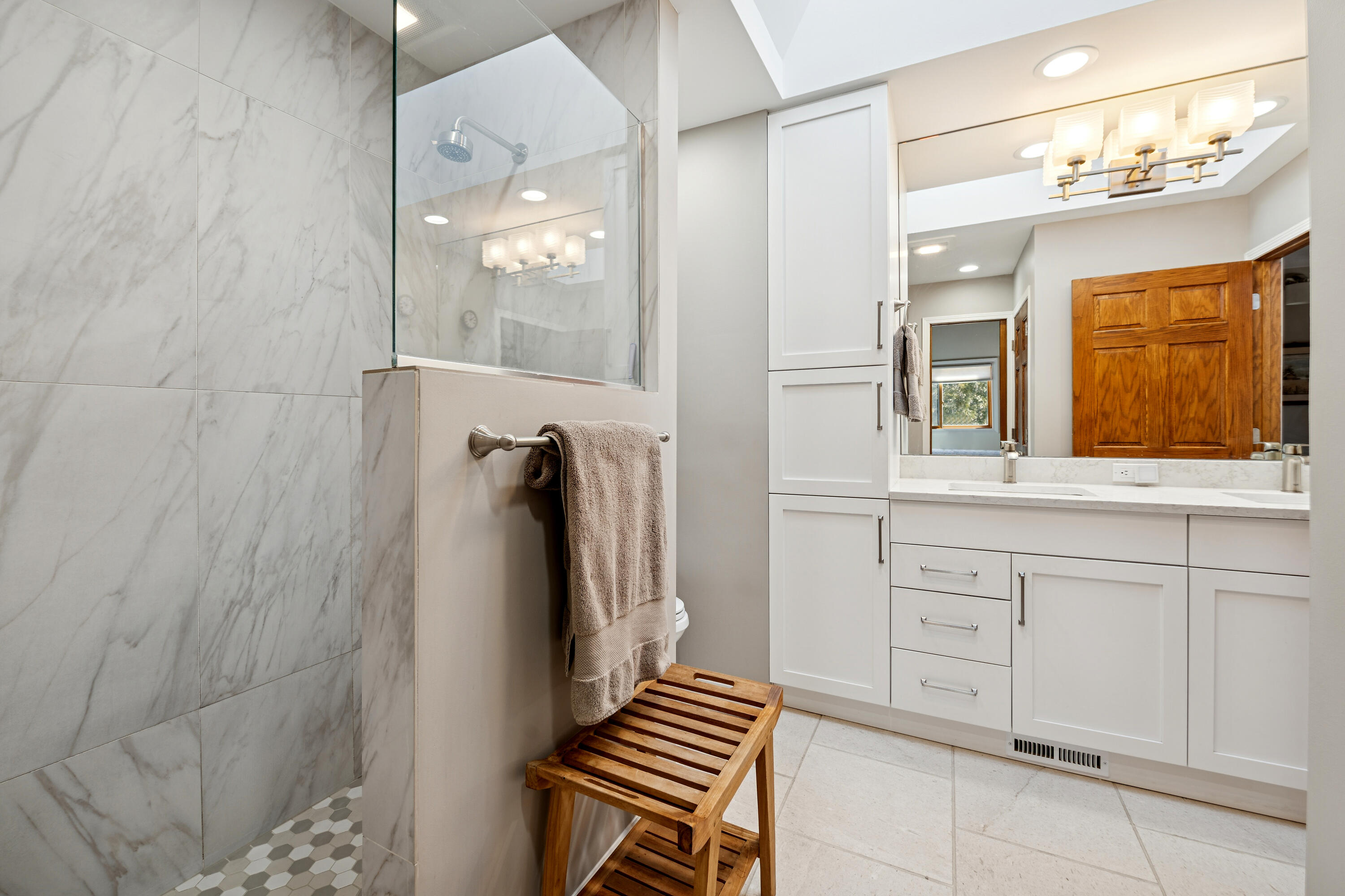 N2337 West Main Road Linn, WI 53147 - Photo 12 of 26 Primary bath with tiled walk in shower and dual vanities