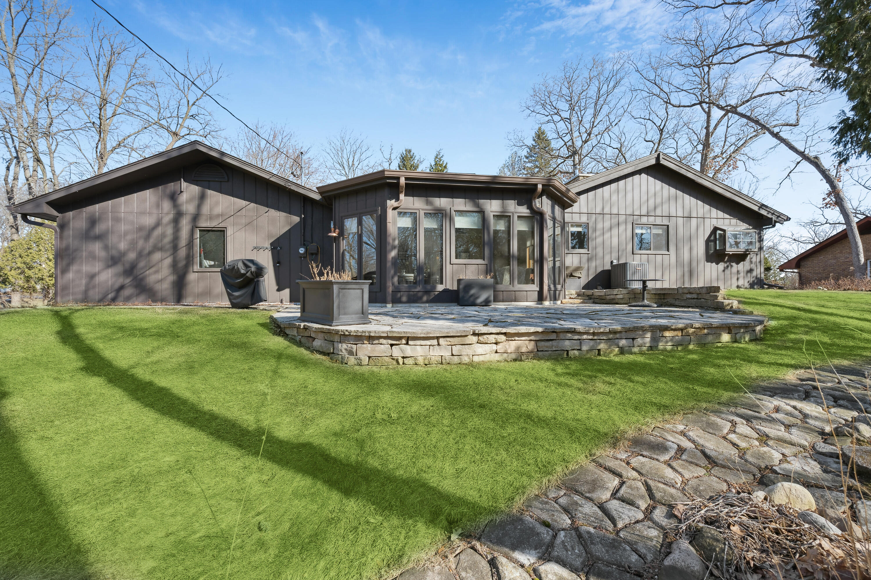 N2337 West Main Road Linn, WI 53147 - Photo 18 of 26 Backyard with stone patio