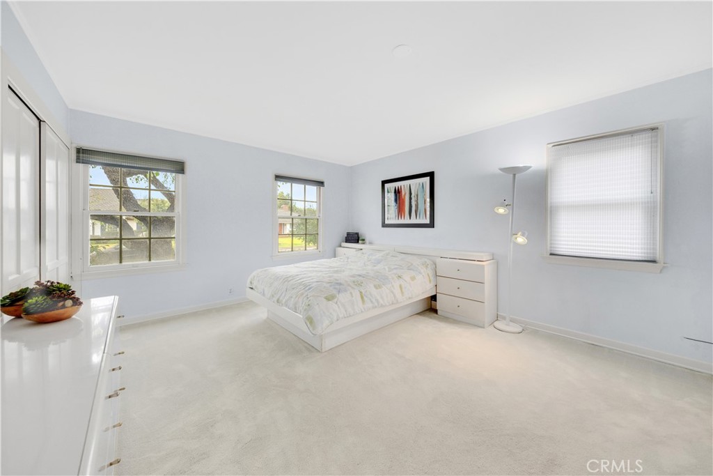 2835 Devonport Road San Marino, CA 91108 - Photo 30 of 54 a spacious bedroom with a bed and a window