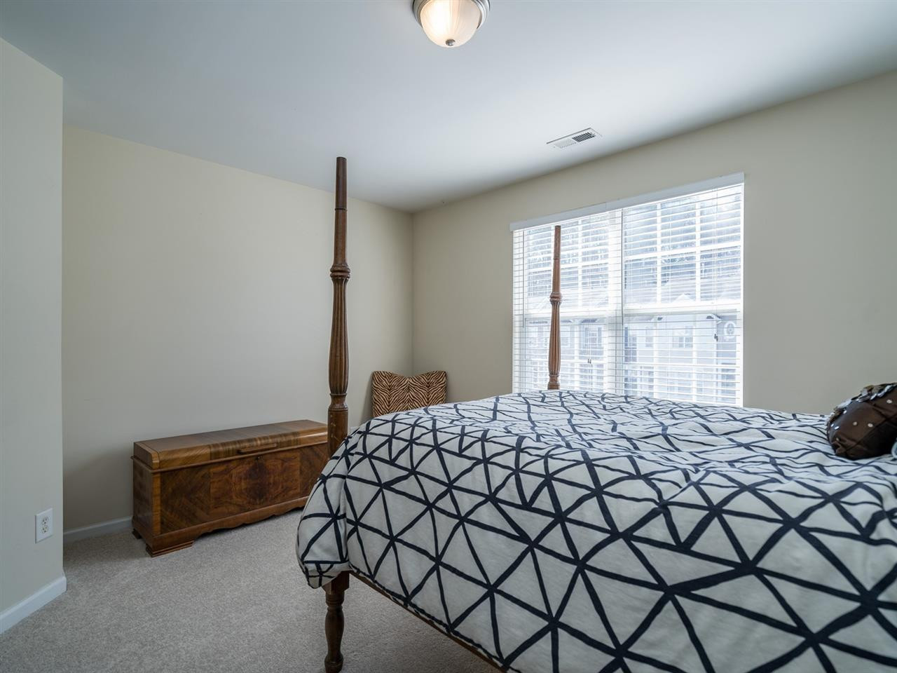 4414 Sugarbend Way Raleigh, NC 27606 - Photo 20 of 24 Both bedrooms are located on the second floor. Bedroom