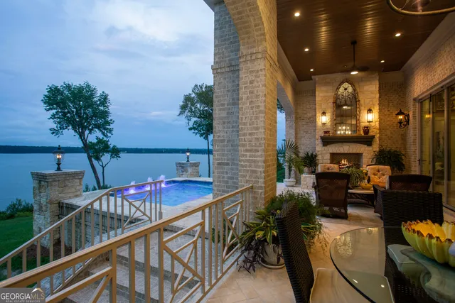 a kitchen with stainless steel appliances granite countertop a refrigerator and a stove