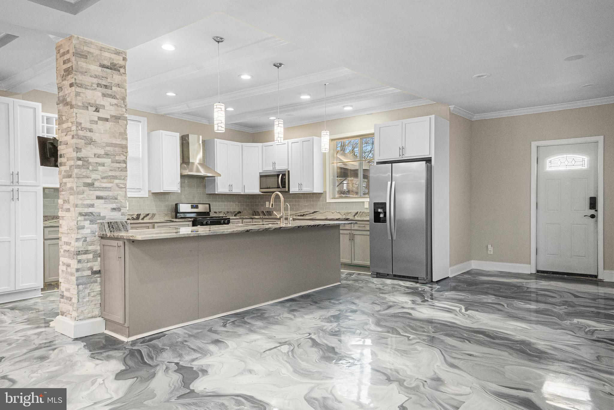 3200 Chelsea Terrace Baltimore, MD 21216 - Photo 13 of 48 a kitchen with stainless steel appliances granite countertop a refrigerator sink and cabinets