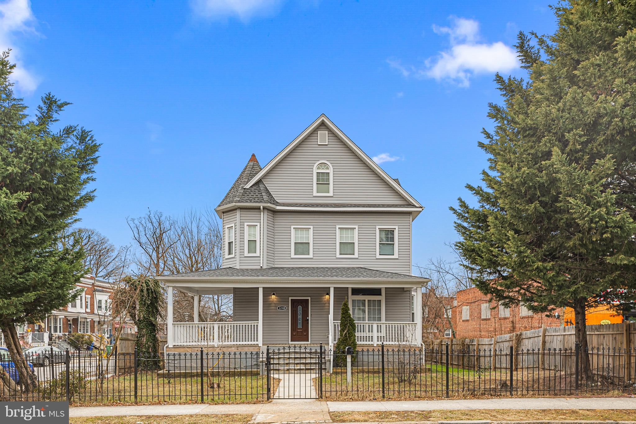 3200 Chelsea Terrace Baltimore, MD 21216 - Photo 2 of 48 a front view of a house with a garden