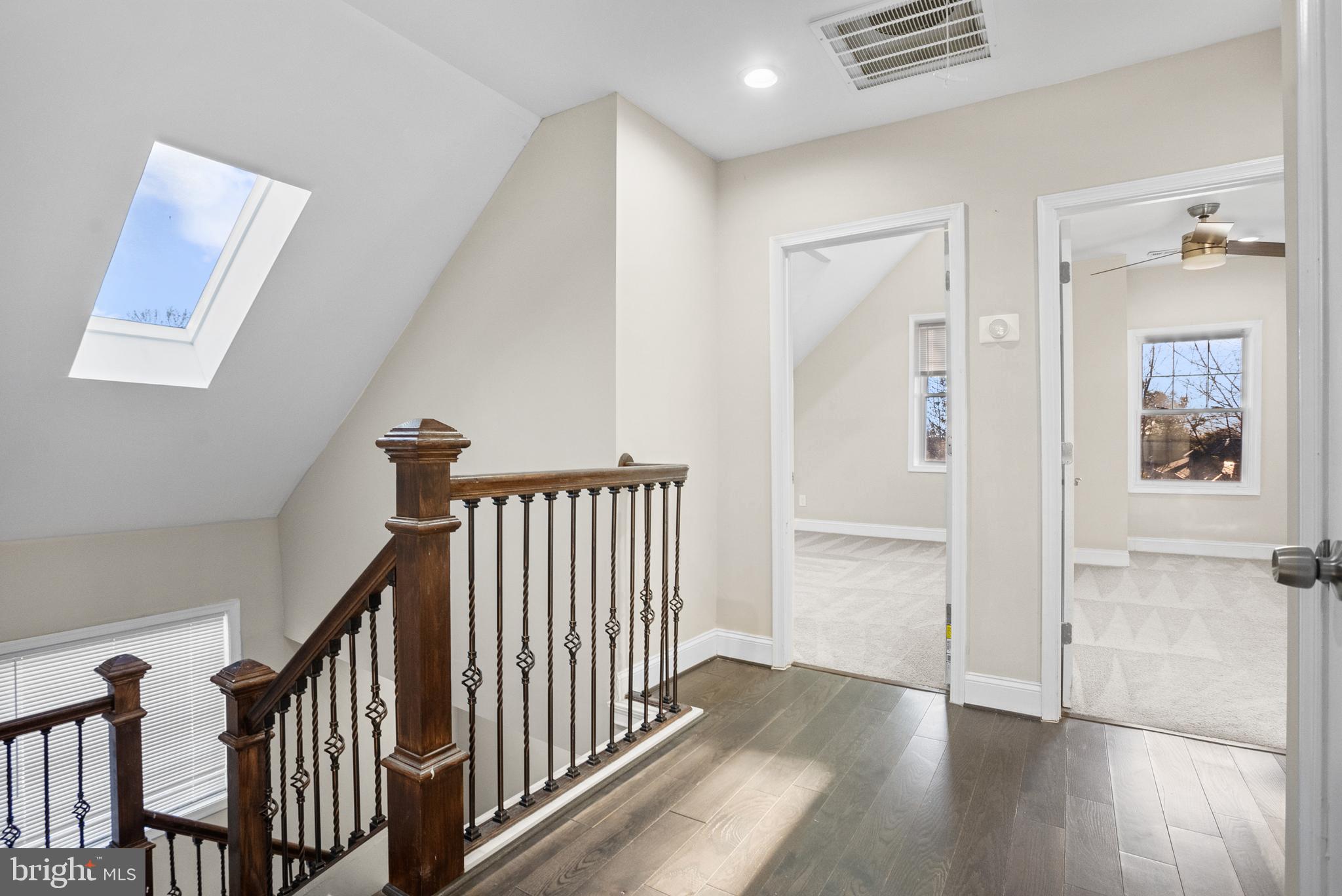 3200 Chelsea Terrace Baltimore, MD 21216 - Photo 36 of 48 a view of a hallway with wooden floor and stairs