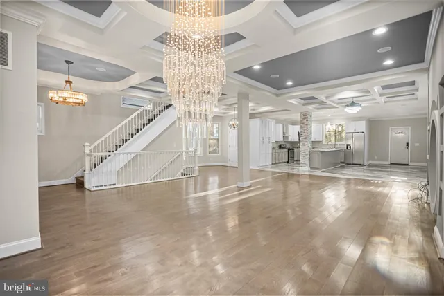 a view of an entryway with a chandelier