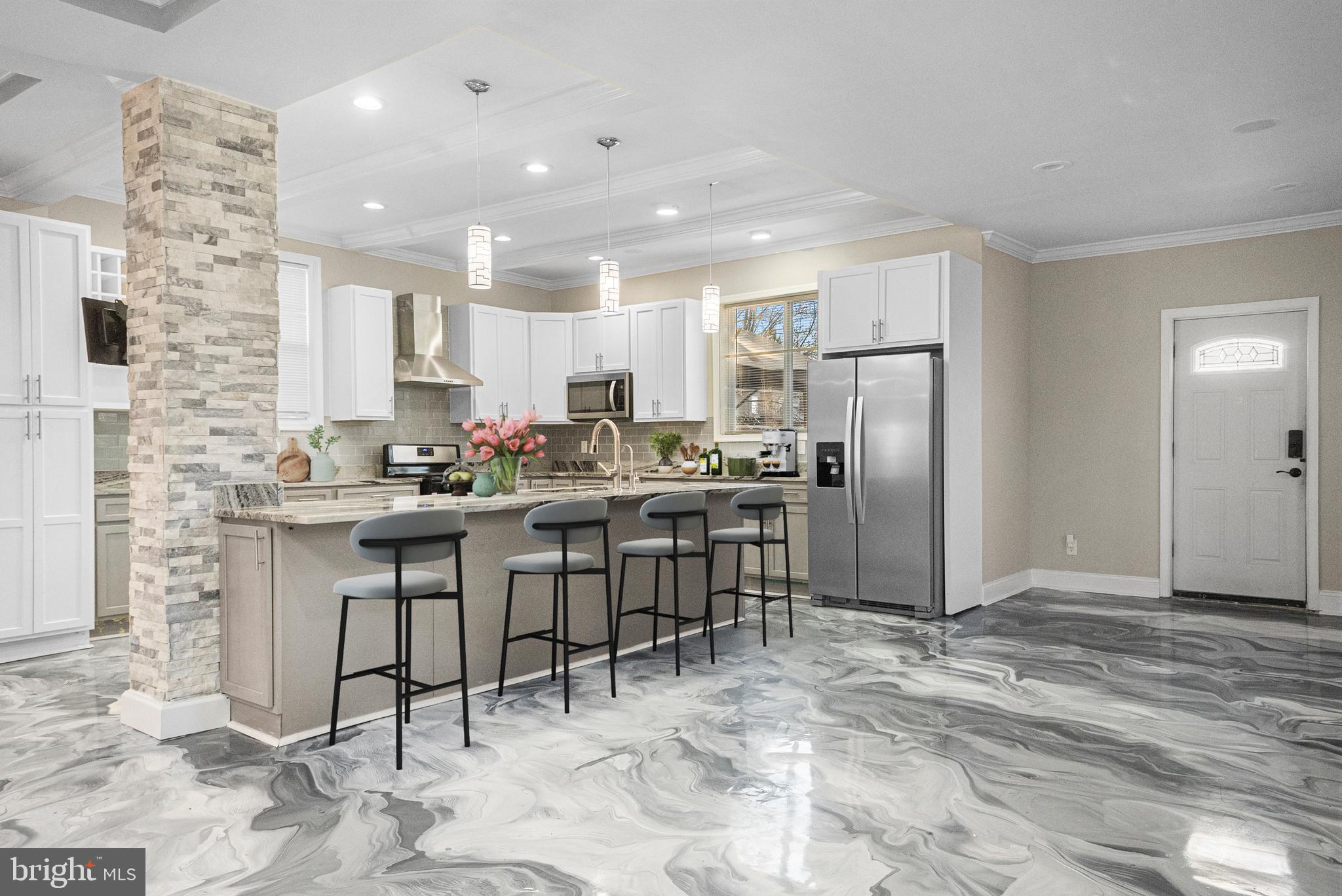 3200 Chelsea Terrace Baltimore, MD 21216 - Photo 9 of 48 a kitchen with stainless steel appliances a refrigerator sink and cabinets