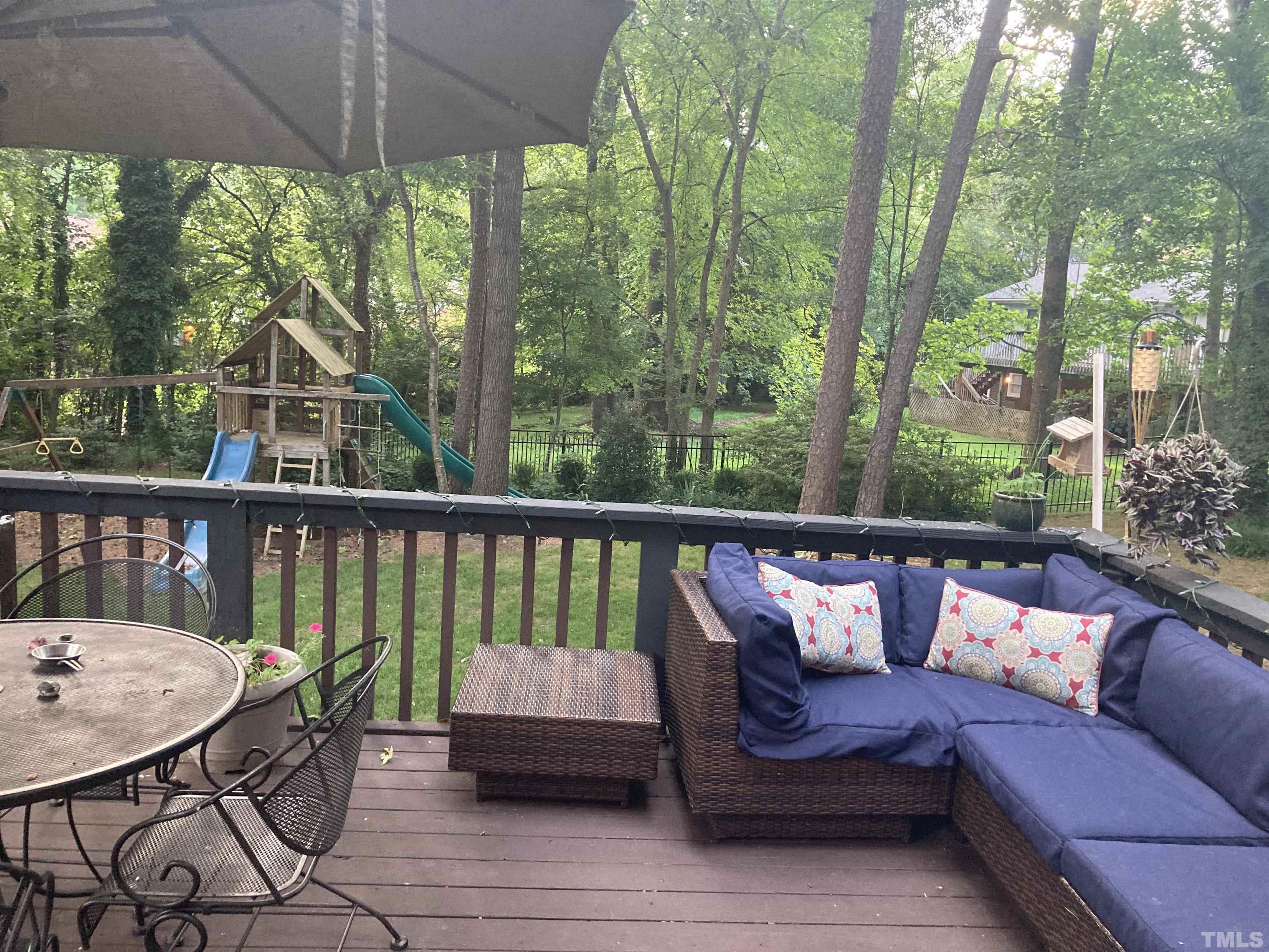 1501 Windbur Place Raleigh, NC 27609 - Photo 3 of 16 a view of a two chairs in the deck