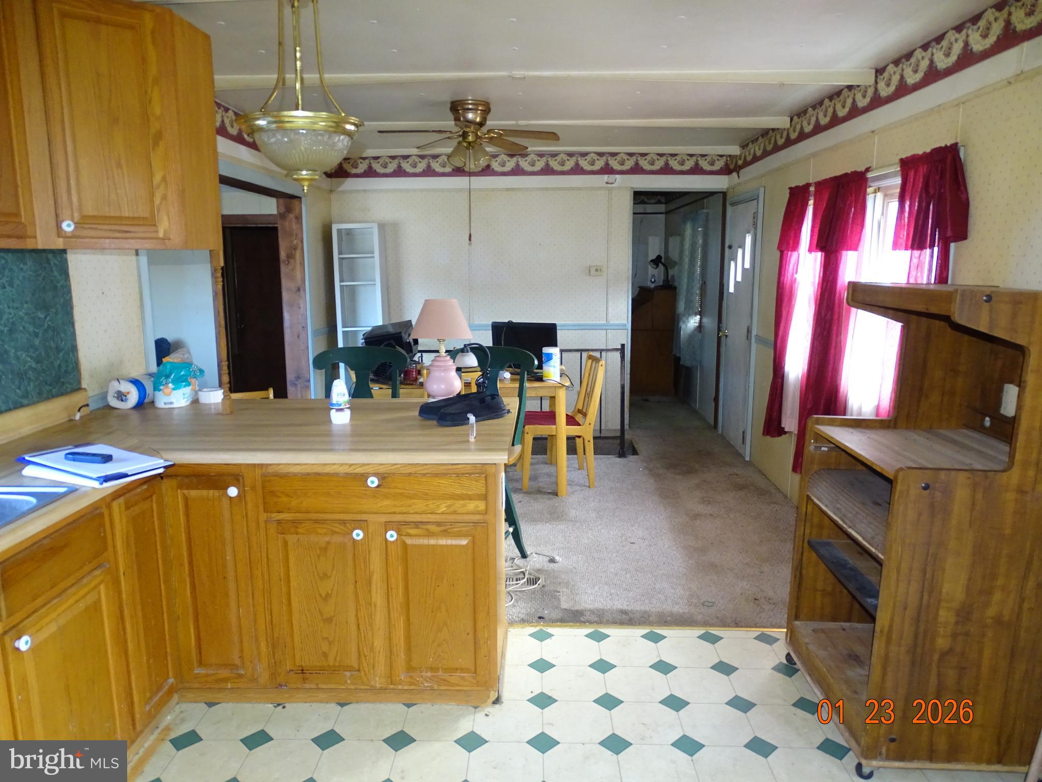 1091 Valley View Road York, PA 17406 - Photo 14 of 28 a kitchen with stainless steel appliances granite countertop a sink dishwasher and a refrigerator with wooden floor