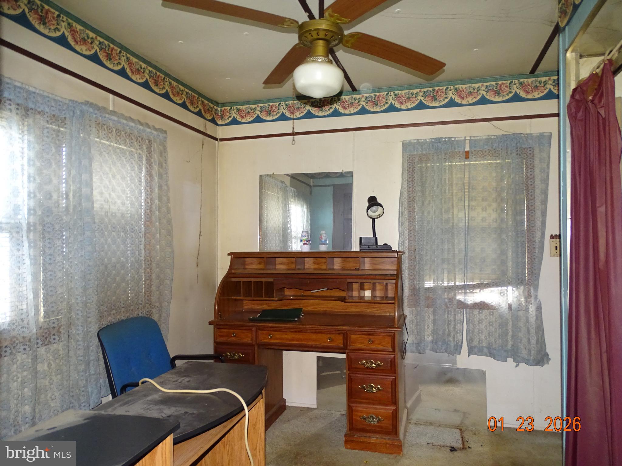 1091 Valley View Road York, PA 17406 - Photo 17 of 28 a room with a mirror and a fan