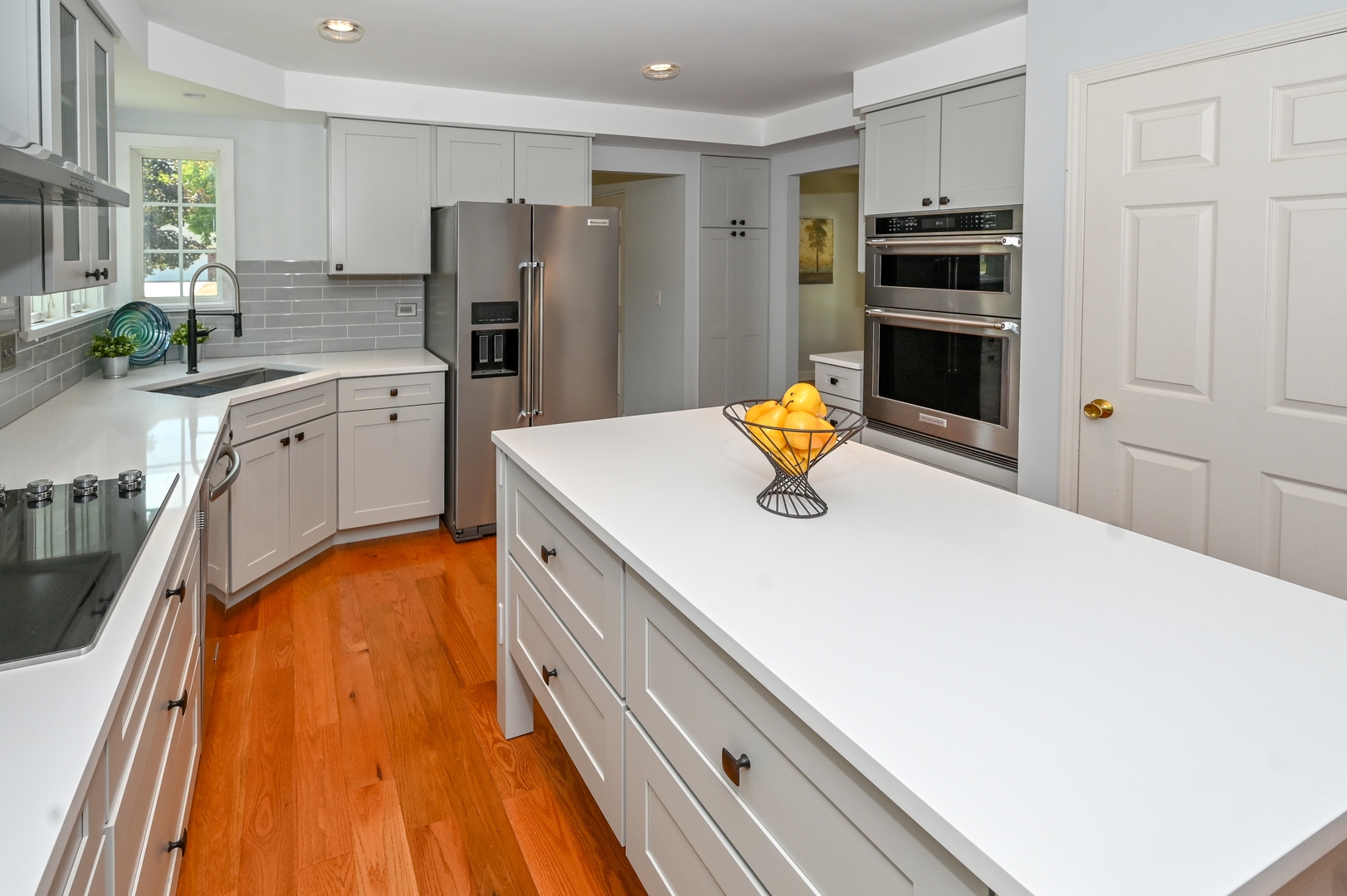 413 Rugby Place Schaumburg, IL 60169 - Photo 14 of 30 a kitchen with stainless steel appliances a refrigerator sink and stove