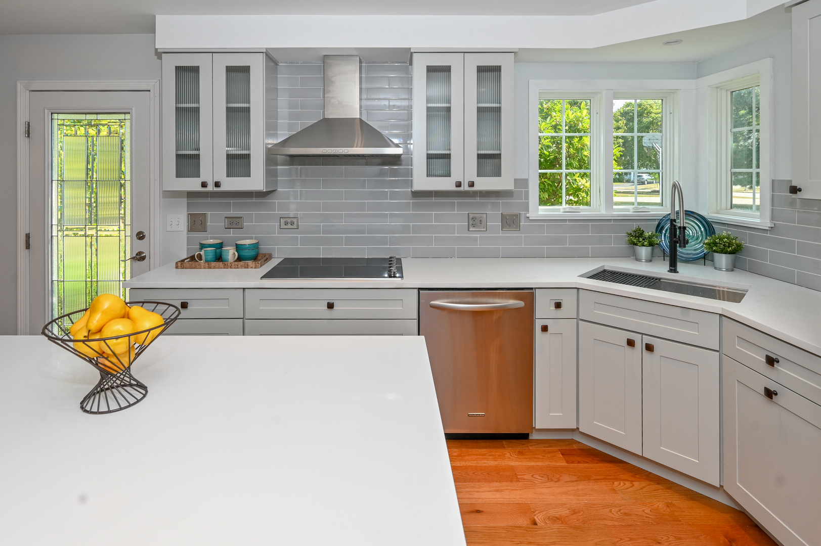 413 Rugby Place Schaumburg, IL 60169 - Photo 15 of 30 a kitchen with a sink a counter top space and appliances