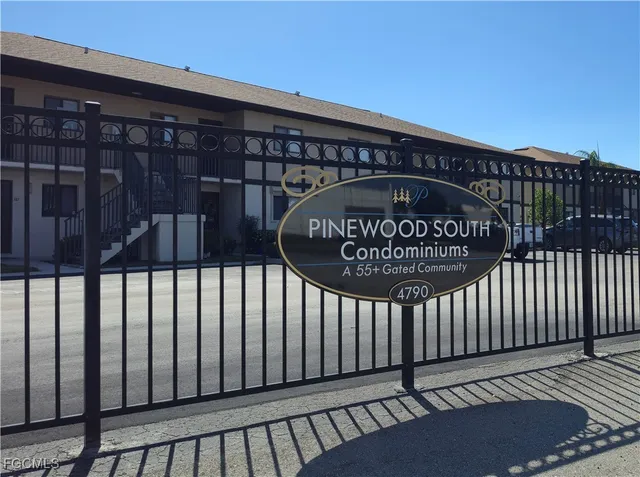a view of a balcony with furniture