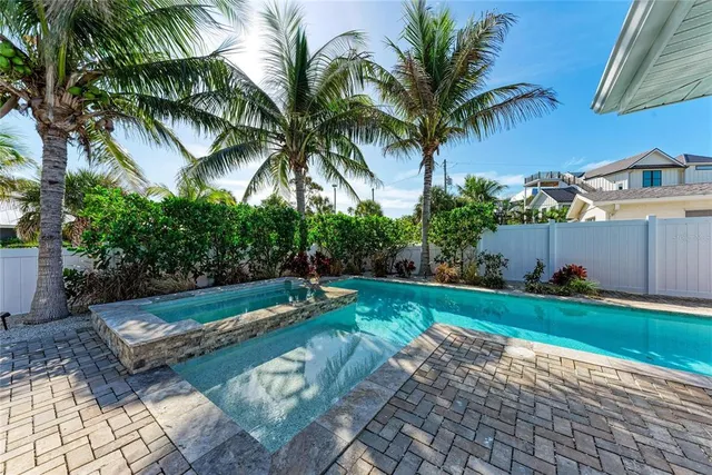 a view of a backyard with a garden