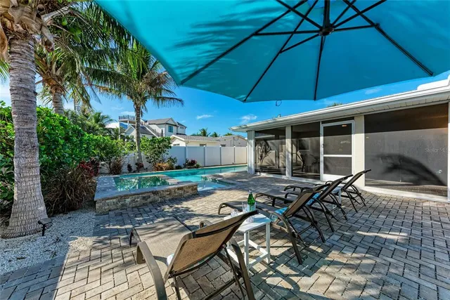 a lake view with a wooden bridge
