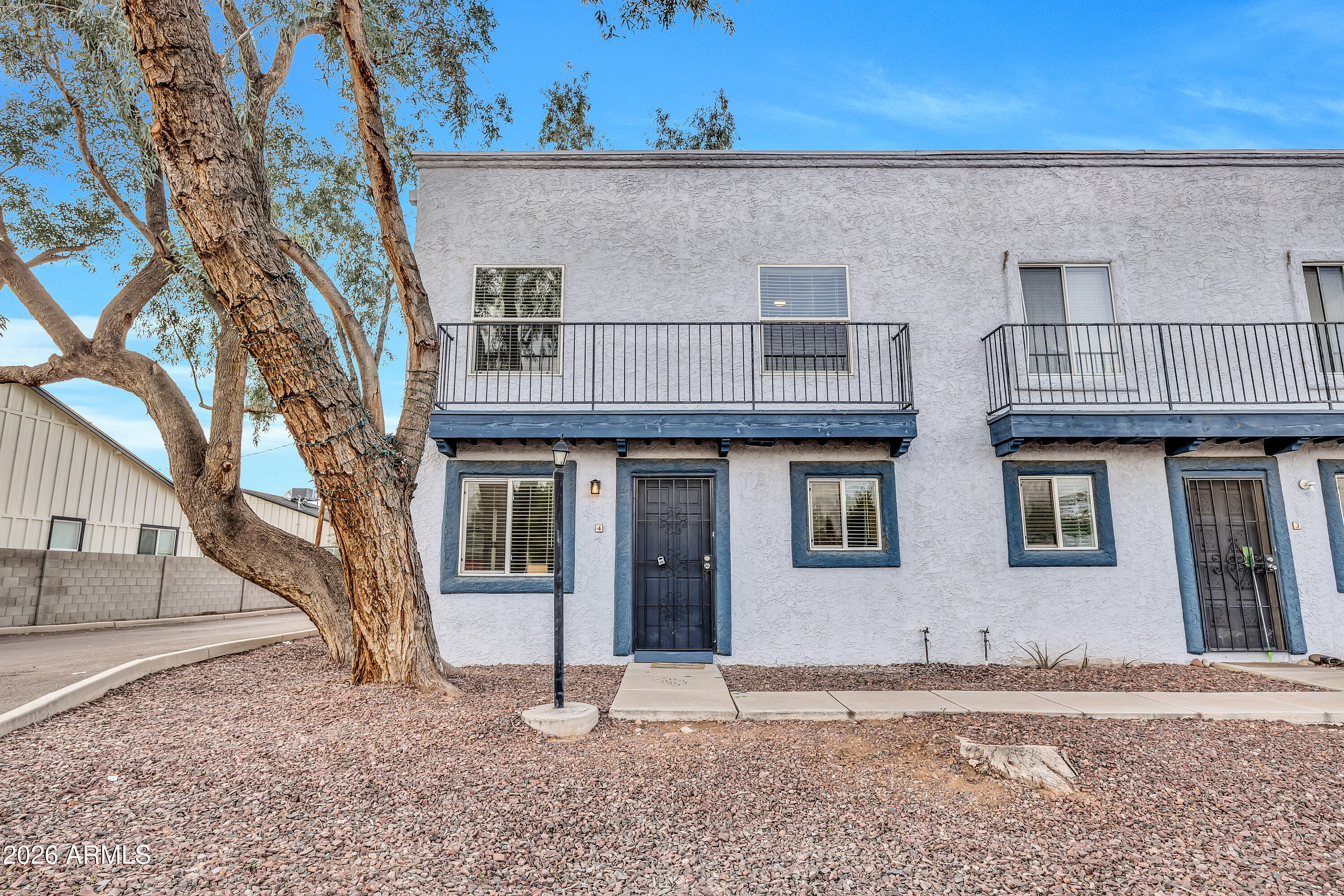 4142 North 11th Street, Unit 4 Phoenix, AZ 85014 - Photo 1 of 25 a house with a outdoor space