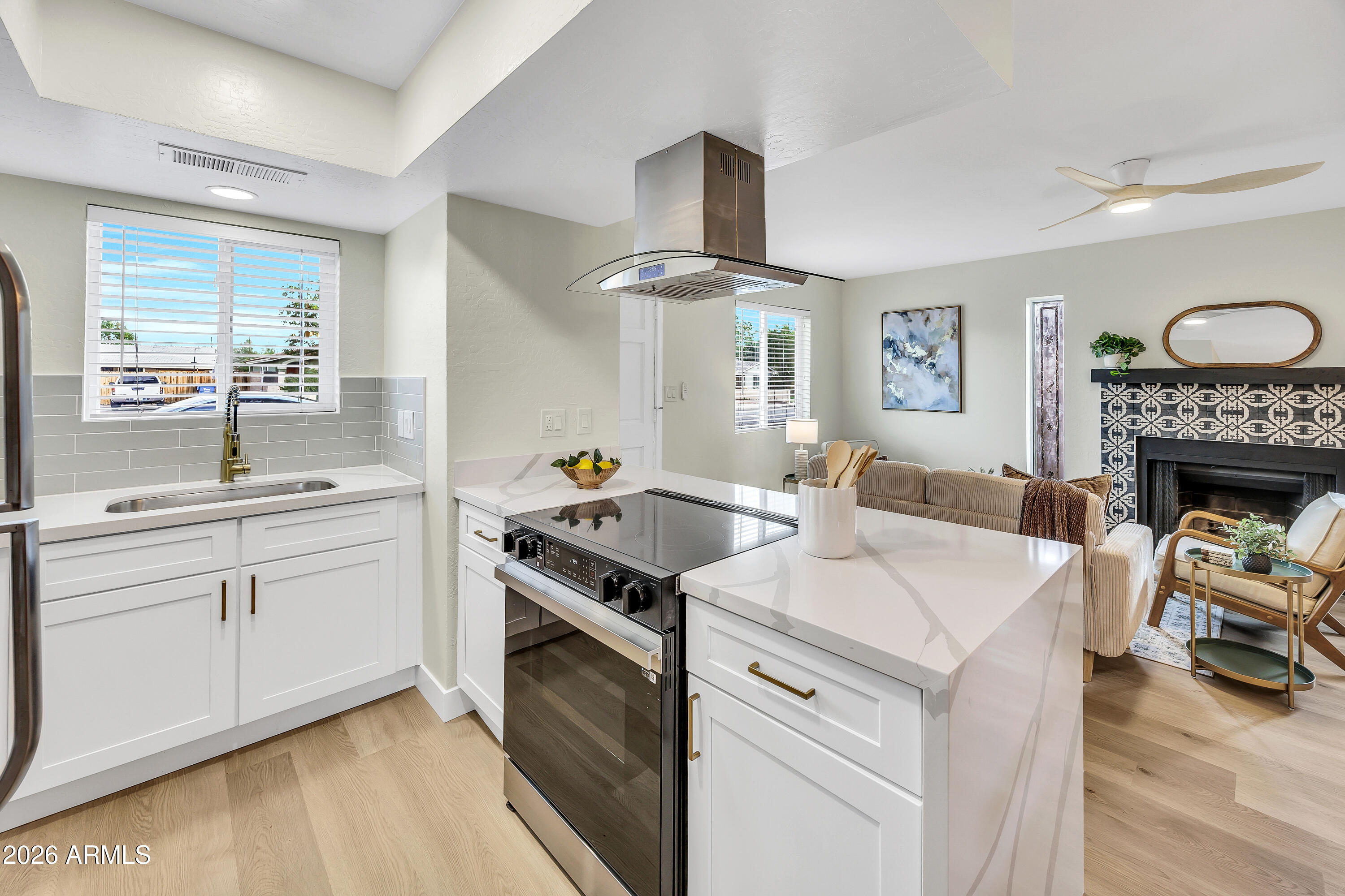 4142 North 11th Street, Unit 4 Phoenix, AZ 85014 - Photo 9 of 25 a kitchen with a stove and a sink