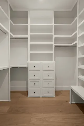 a view of an empty walk in closet
