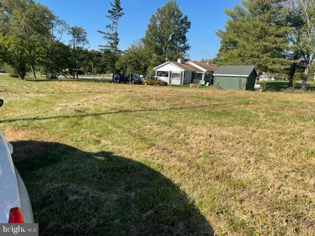 a view of a yard with an outdoor space