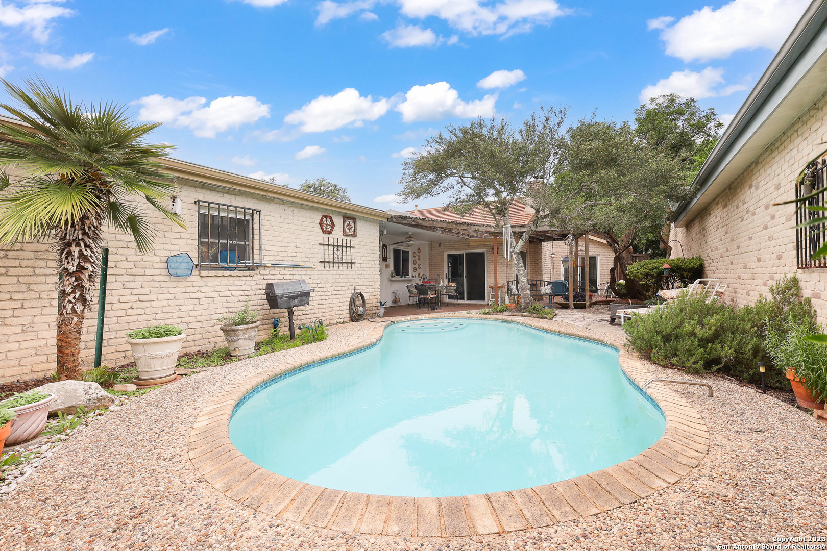 346 Fenwick Drive Windcrest, TX 78239 - Photo 1 of 1 a view of a house with backyard patio and swimming pool