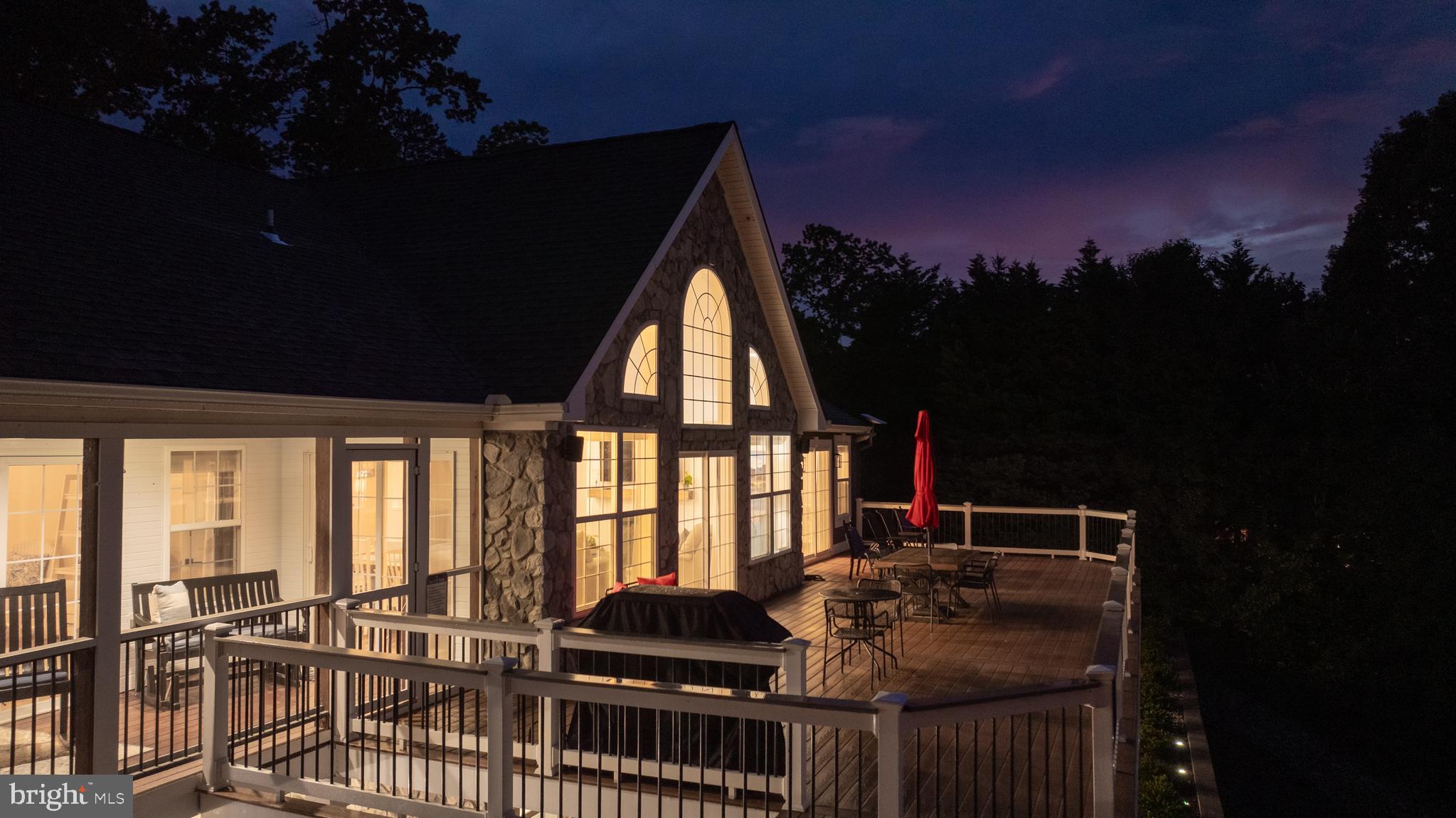 1069 Mitchell Point Road Mineral, VA 23117 - Photo 104 of 110 a living room with furniture and a floor to ceiling window
