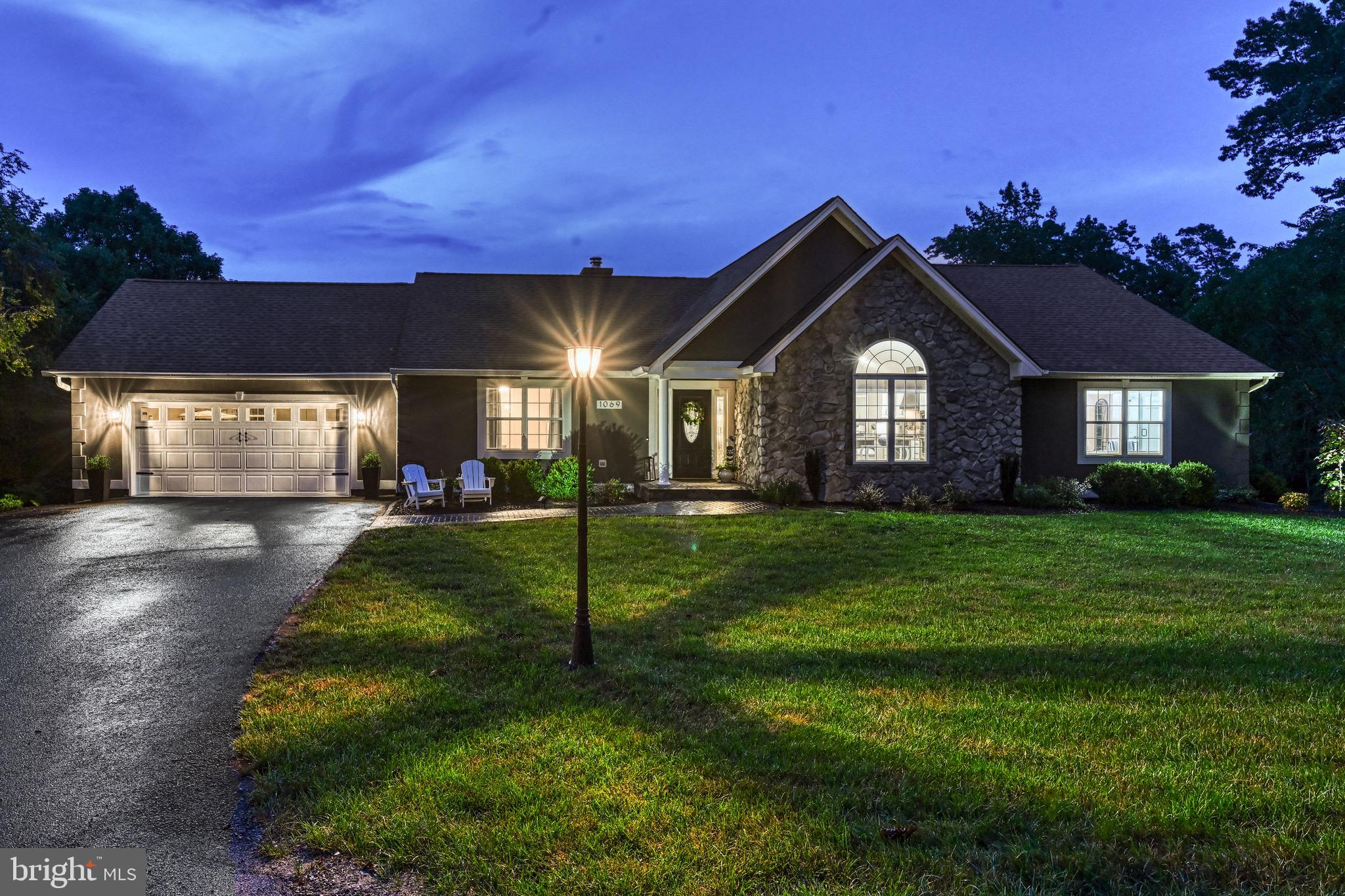 1069 Mitchell Point Road Mineral, VA 23117 - Photo 15 of 110 a front view of a house with a yard
