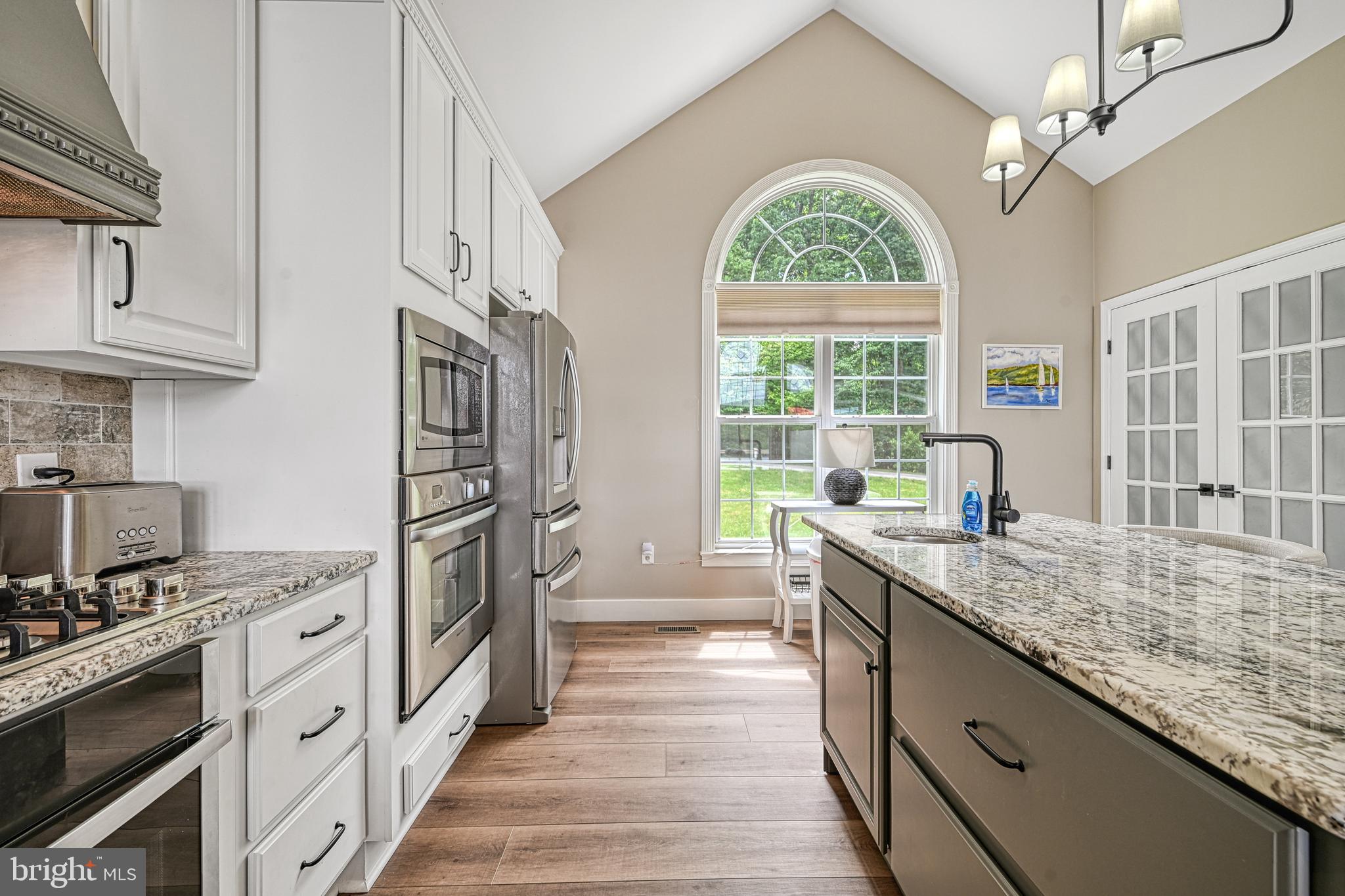1069 Mitchell Point Road Mineral, VA 23117 - Photo 30 of 110 a kitchen with stainless steel appliances granite countertop a stove and a white cabinets