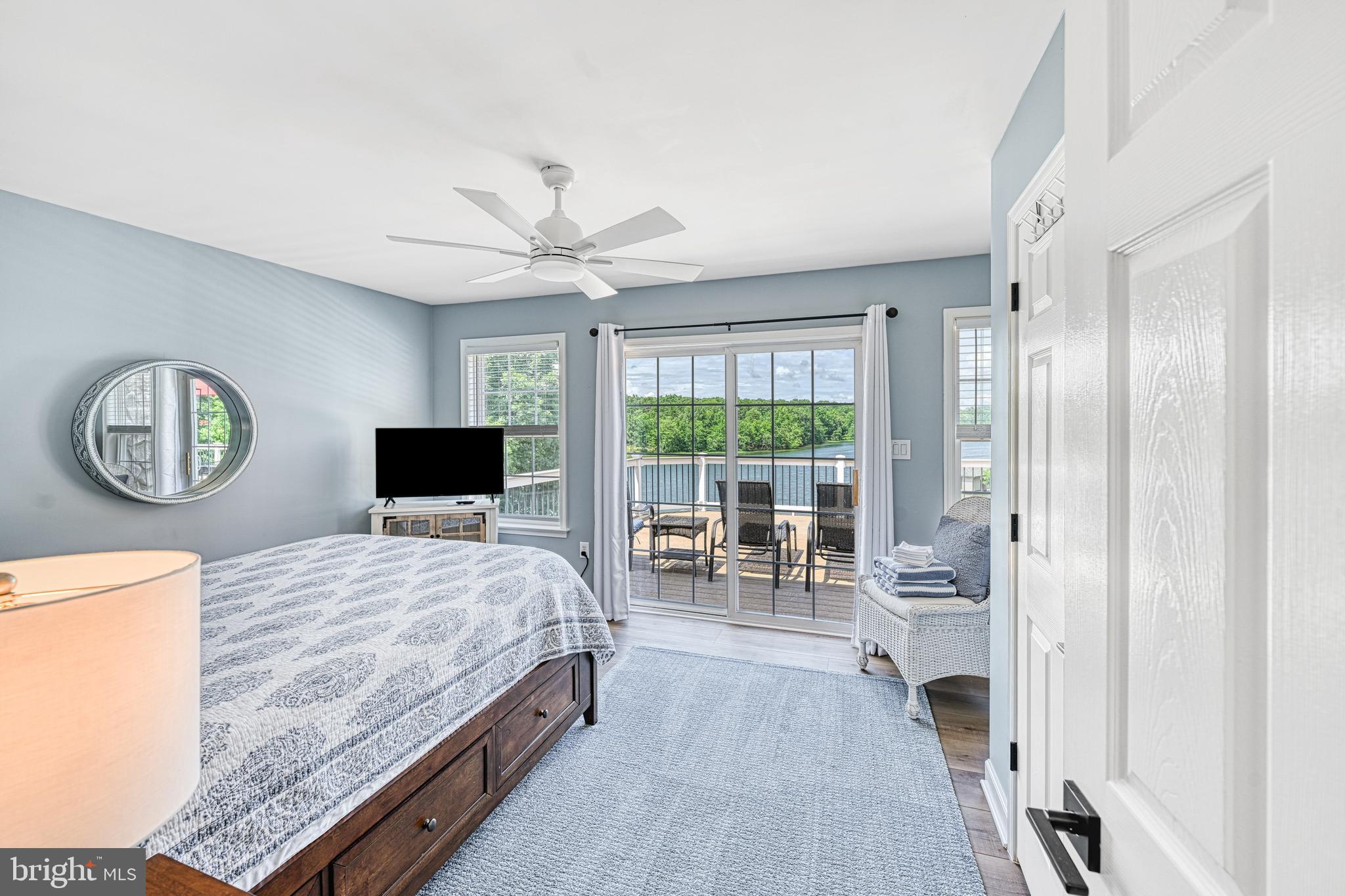 1069 Mitchell Point Road Mineral, VA 23117 - Photo 46 of 110 a bedroom with a bed and a large window