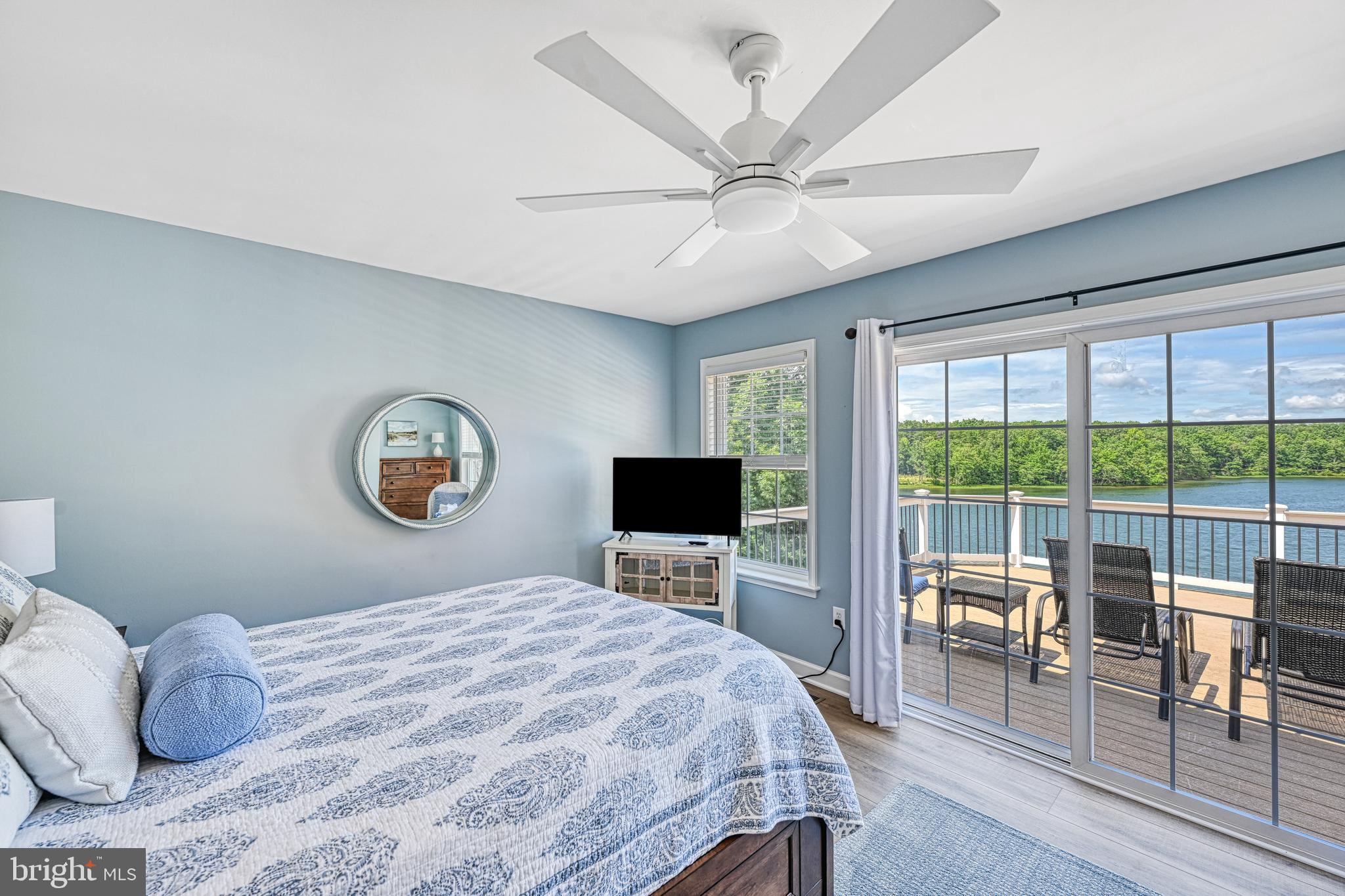 1069 Mitchell Point Road Mineral, VA 23117 - Photo 49 of 110 a bedroom with a bed and a flat screen tv