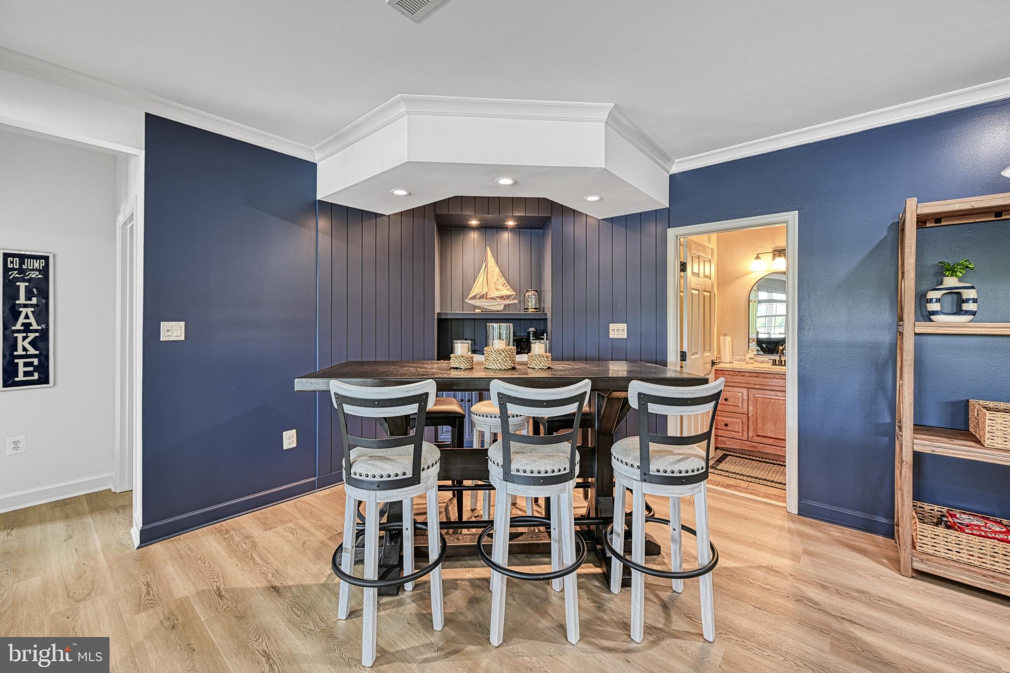 1069 Mitchell Point Road Mineral, VA 23117 - Photo 57 of 110 a view of a dining room with furniture and wooden floor