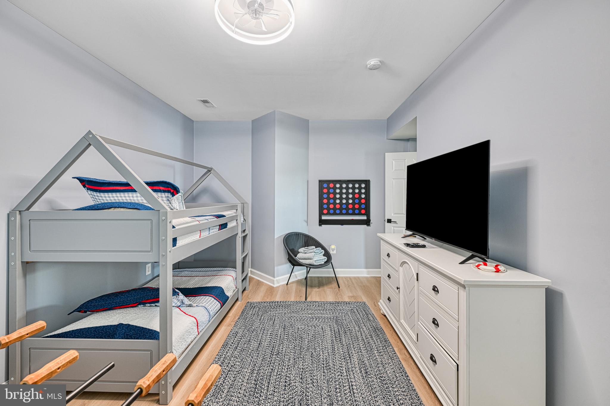 1069 Mitchell Point Road Mineral, VA 23117 - Photo 63 of 110 a living room with furniture and a flat screen tv