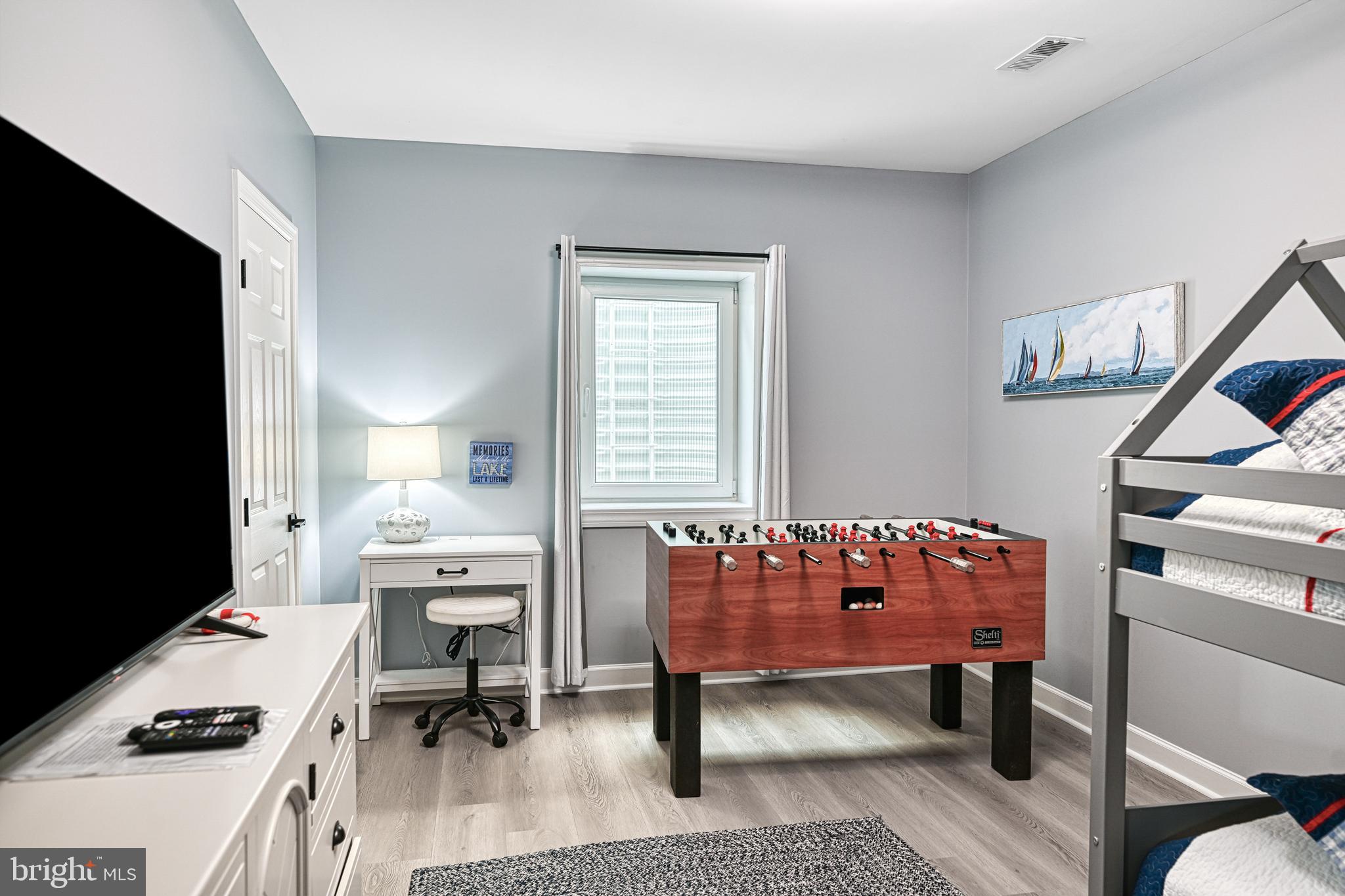 1069 Mitchell Point Road Mineral, VA 23117 - Photo 65 of 110 a living room with furniture and a flat screen tv