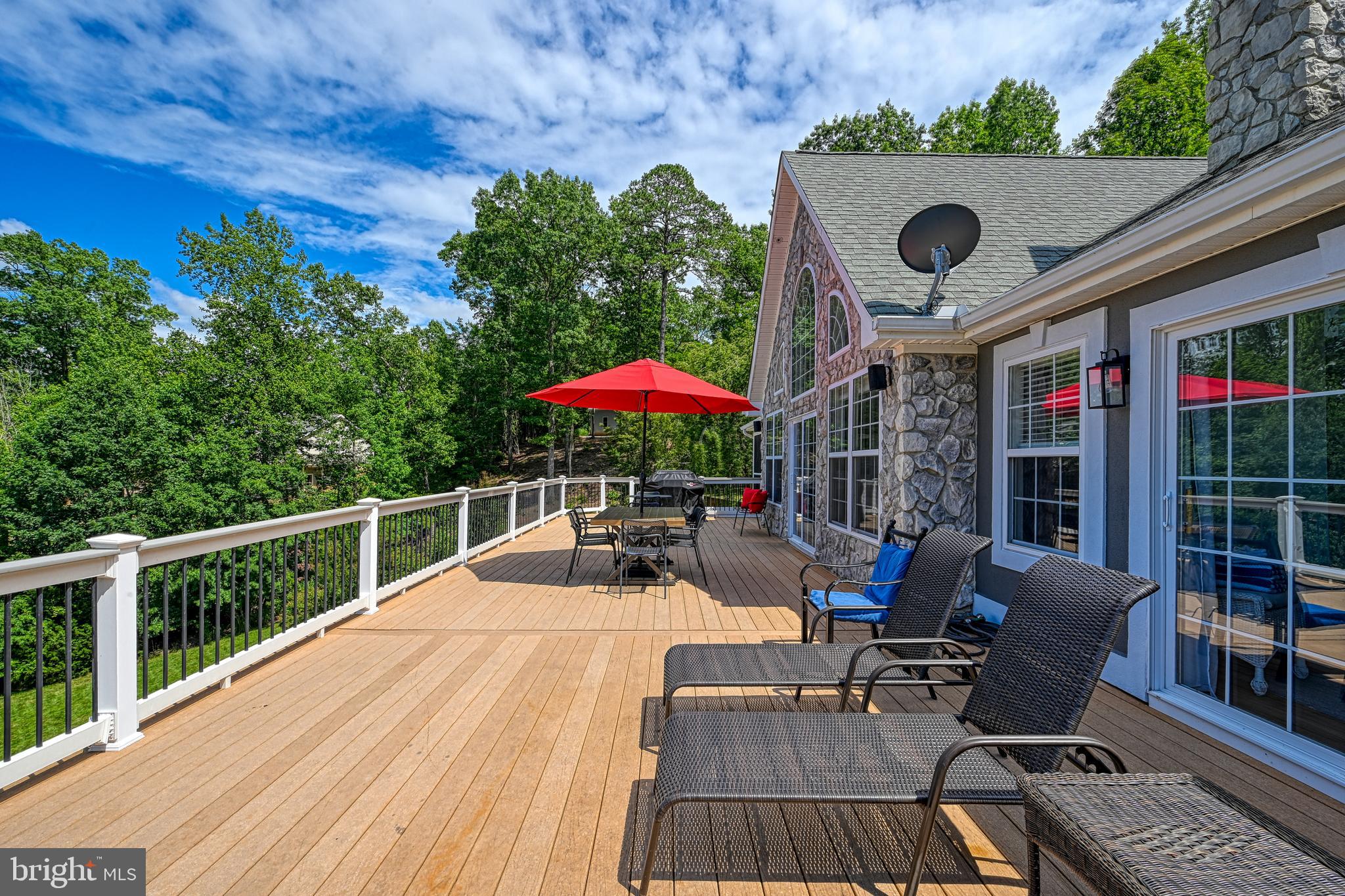 1069 Mitchell Point Road Mineral, VA 23117 - Photo 74 of 110 a view of a chairs and table in patio with a fire pit