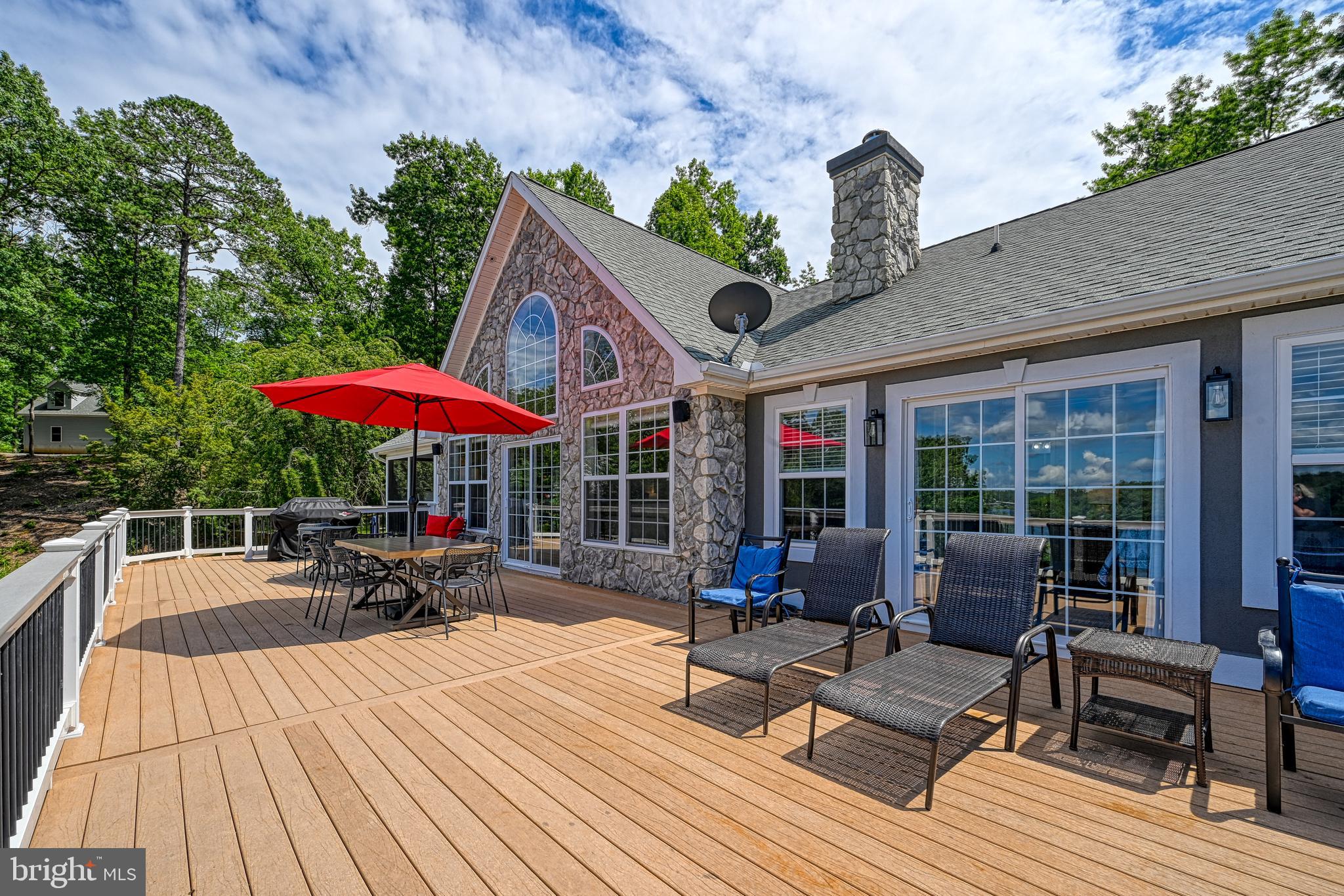 1069 Mitchell Point Road Mineral, VA 23117 - Photo 75 of 110 a view of outdoor space yard deck patio and outdoor kitchen