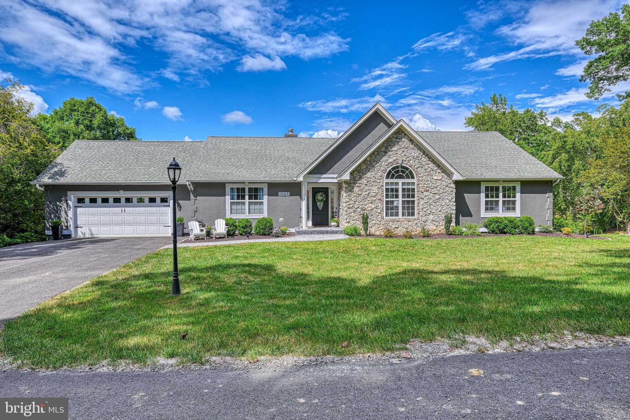 1069 Mitchell Point Road Mineral, VA 23117 - Photo 84 of 110 a view of a house with a backyard