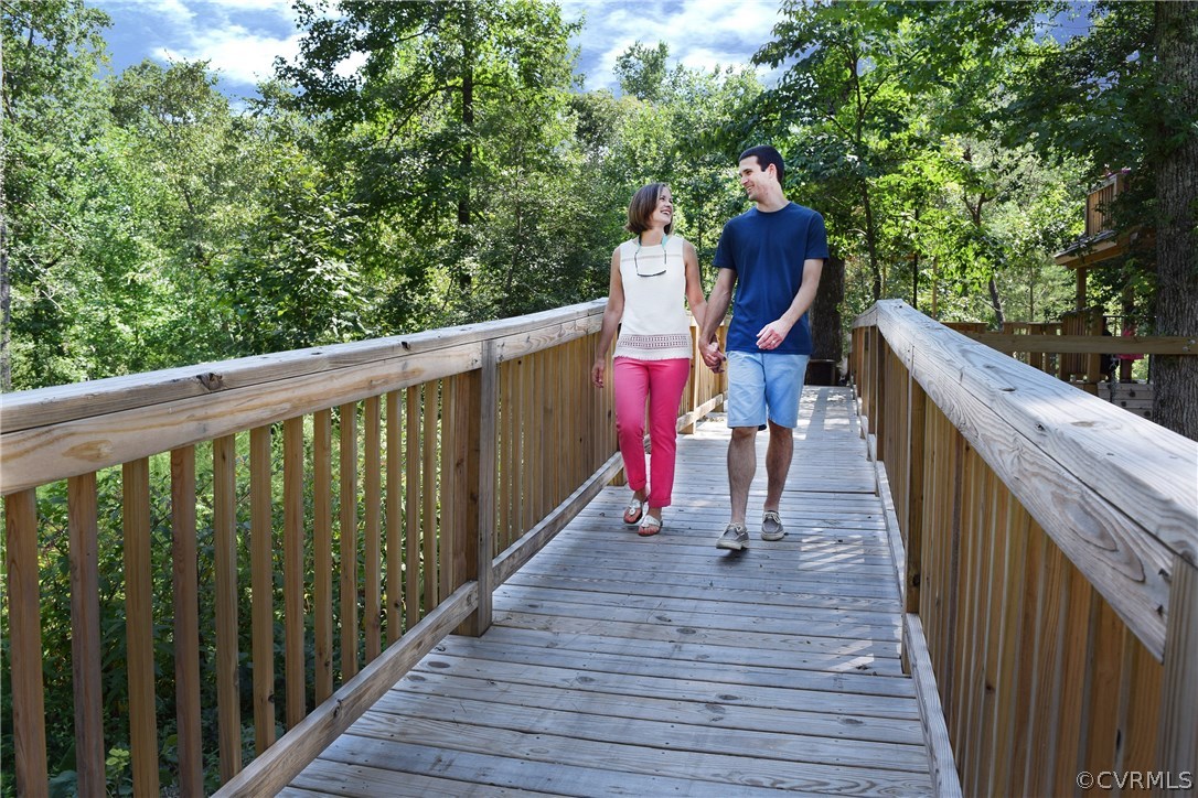 10875 Holman Ridge Road Glen Allen, VA 23059 - Photo 15 of 17 a view of a deck with wooden floor and stairs