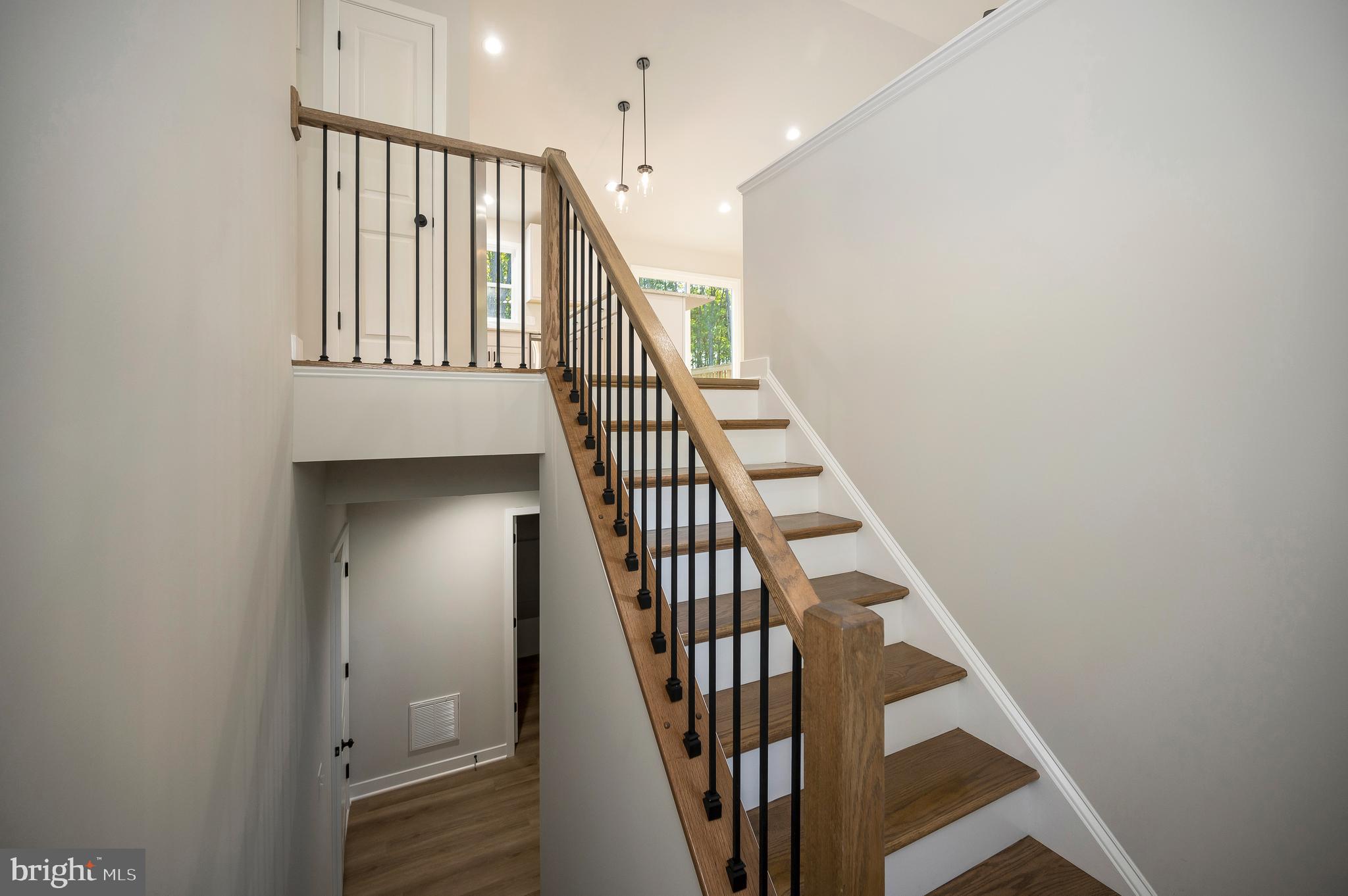 3153 Lewiston Road Bumpass, VA 23024 - Photo 11 of 45 a view of staircase with railing and white walls