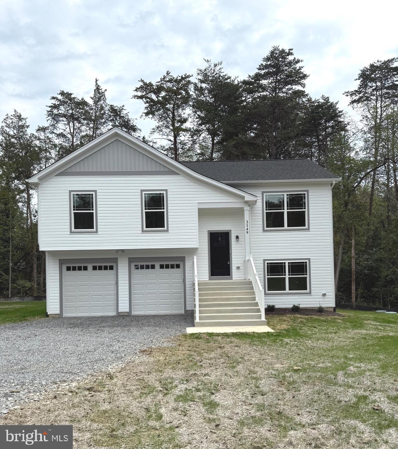 3153 Lewiston Road Bumpass, VA 23024 - Photo 41 of 45 a view of a house with a yard